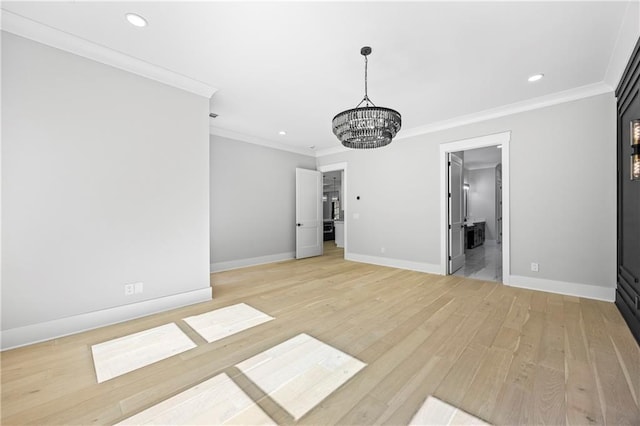 407 Thunder Rd, Buford, GA 30518 - unfurnished living room with a chandelier, crown molding, baseboards, recessed lighting, and light wood finished floors