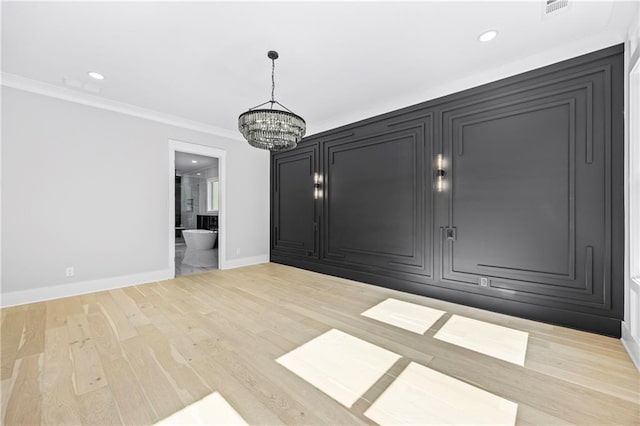 407 Thunder Rd, Buford, GA 30518 - unfurnished dining area with a chandelier, baseboards, ornamental molding, light wood-style flooring, and recessed lighting