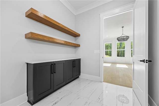 407 Thunder Rd, Buford, GA 30518 - bar featuring baseboards, light marble finish floors, and ornamental molding