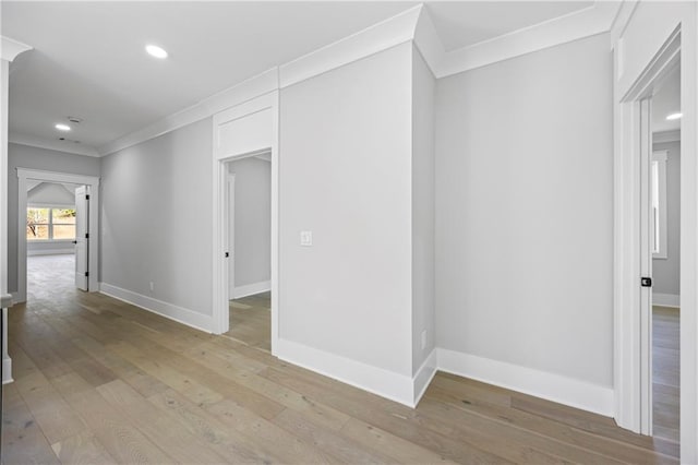 407 Thunder Rd, Buford, GA 30518 - spare room featuring crown molding, light wood-type flooring, baseboards, and recessed lighting