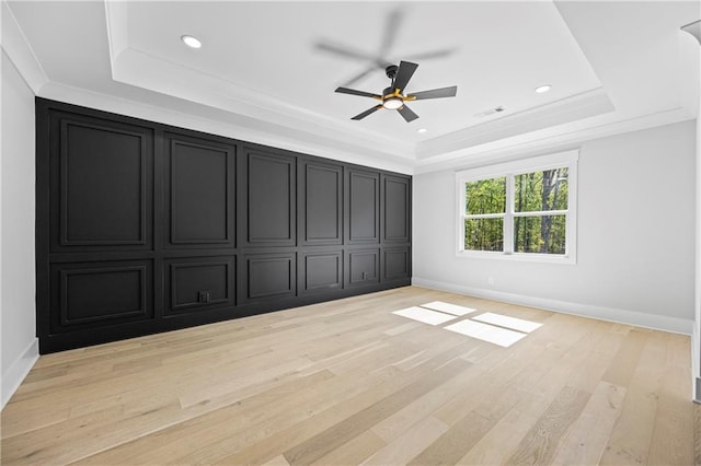 407 Thunder Rd, Buford, GA 30518 - unfurnished bedroom with a raised ceiling, light wood-style floors, recessed lighting, baseboards, and a ceiling fan
