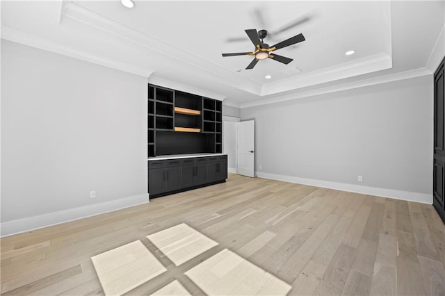 407 Thunder Rd, Buford, GA 30518 - unfurnished living room featuring a tray ceiling, ornamental molding, ceiling fan, light wood-type flooring, and recessed lighting