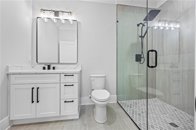 407 Thunder Rd, Buford, GA 30518 - bathroom featuring a shower stall, toilet, vanity, and baseboards