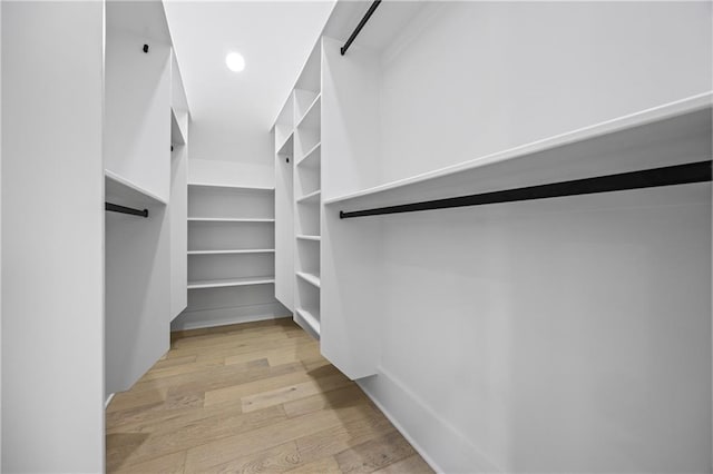 407 Thunder Rd, Buford, GA 30518 - spacious closet featuring wood finished floors and a barn door