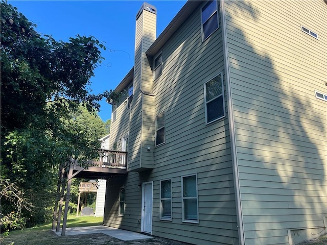 view of home's exterior featuring a patio area