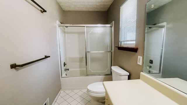 bathroom with toilet, combined bath / shower with glass door, tile patterned floors, and visible vents