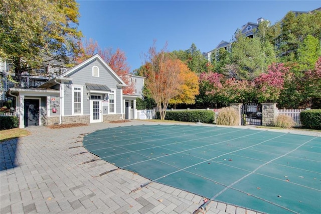 view of pool featuring a patio