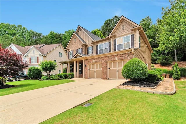 5613 Lancashire Ln, Cumming, GA 30041 - view of front of property with driveway, brick siding, a front yard, and a garage