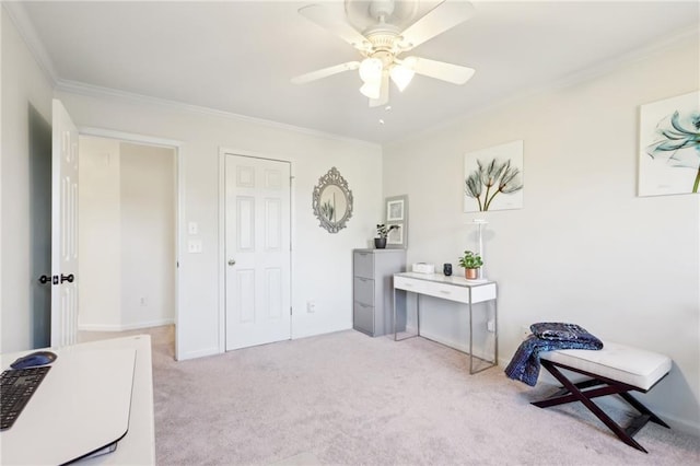 interior space with ceiling fan, light colored carpet, and ornamental molding