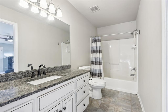 full bathroom featuring ceiling fan, vanity, toilet, and shower / tub combo