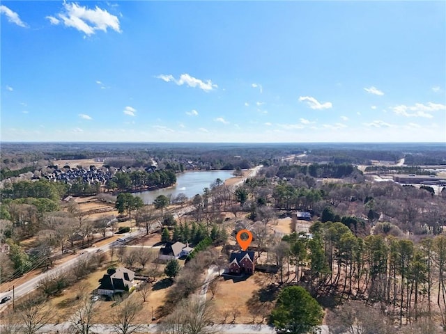 drone / aerial view with a water view