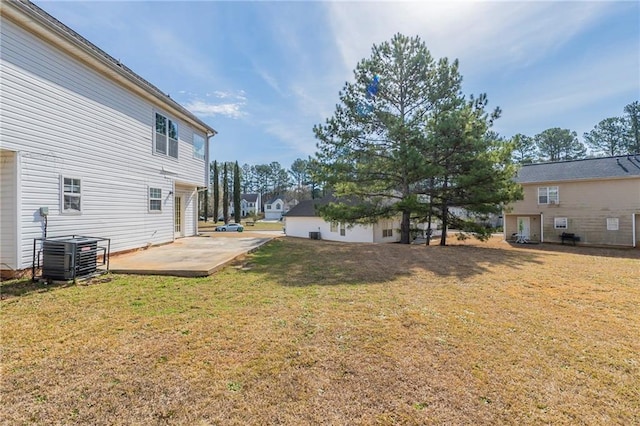 view of yard featuring a patio and cooling unit