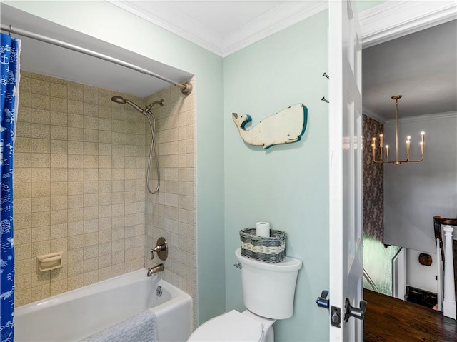 bathroom with an inviting chandelier, ornamental molding, shower / bath combination with curtain, and toilet