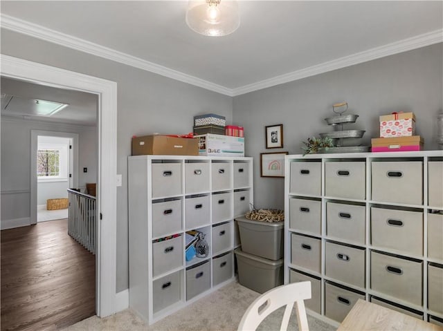 bedroom with ornamental molding and hardwood / wood-style floors