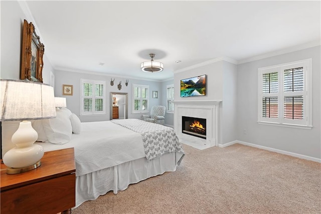4250 Green Ridge Dr NE, Marietta, GA 30062 - bedroom featuring crown molding, multiple windows, a glass covered fireplace, and carpet flooring