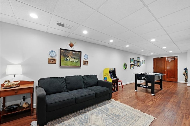 4250 Green Ridge Dr NE, Marietta, GA 30062 - living room with wood finished floors, recessed lighting, and a paneled ceiling