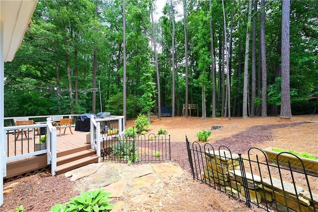 4250 Green Ridge Dr NE, Marietta, GA 30062 - view of yard featuring a deck and outdoor dining area