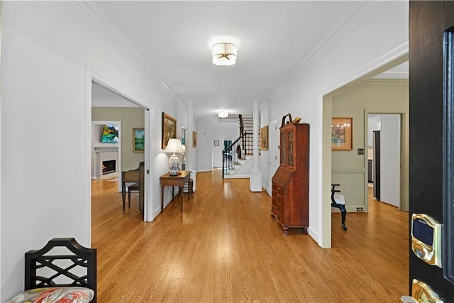4250 Green Ridge Dr NE, Marietta, GA 30062 - hall with ornamental molding, light wood finished floors, and stairway