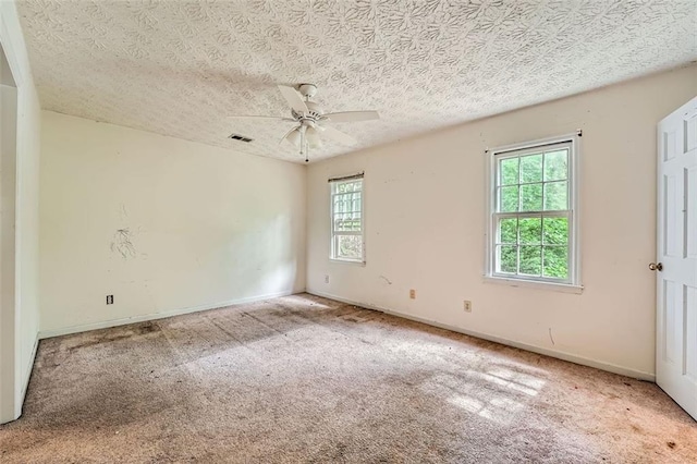 2867 Holly Oaks Dr, Marietta, GA 30062 - carpeted spare room featuring ceiling fan and a textured ceiling
