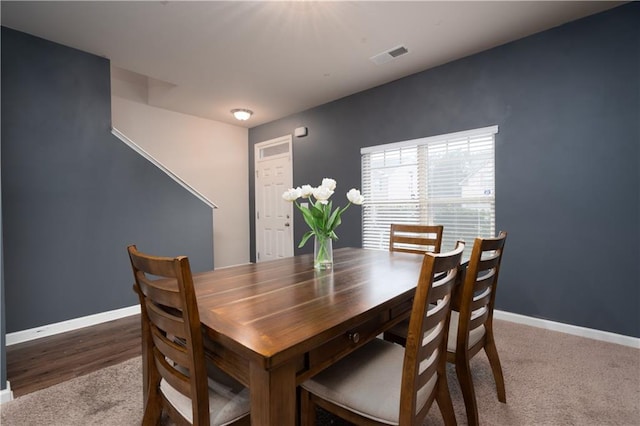 dining area featuring carpet floors