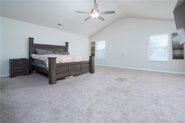 bedroom with lofted ceiling, light colored carpet, and ceiling fan