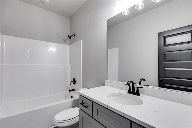 full bathroom with vanity, bathing tub / shower combination, and toilet