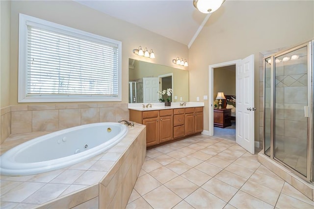 bathroom with vanity, vaulted ceiling, plus walk in shower, and tile patterned floors