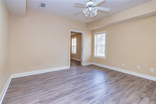 unfurnished room featuring ceiling fan and light hardwood / wood-style floors