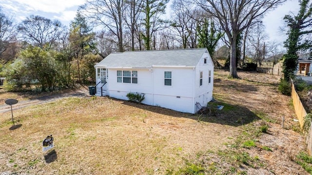 view of front of home featuring crawl space and driveway