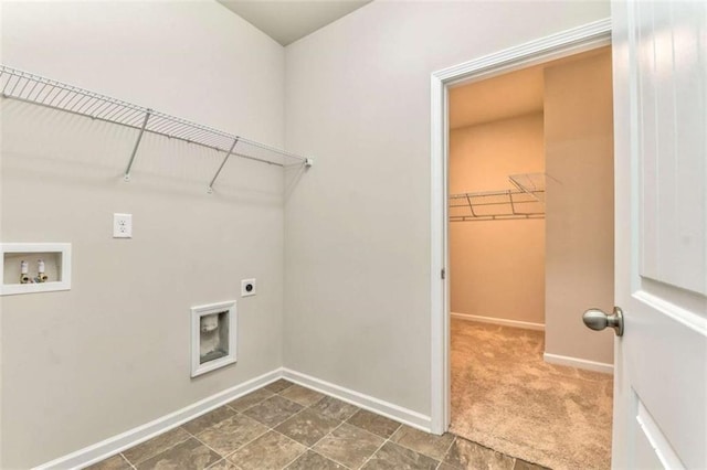 laundry area with washer hookup, electric dryer hookup, and baseboards