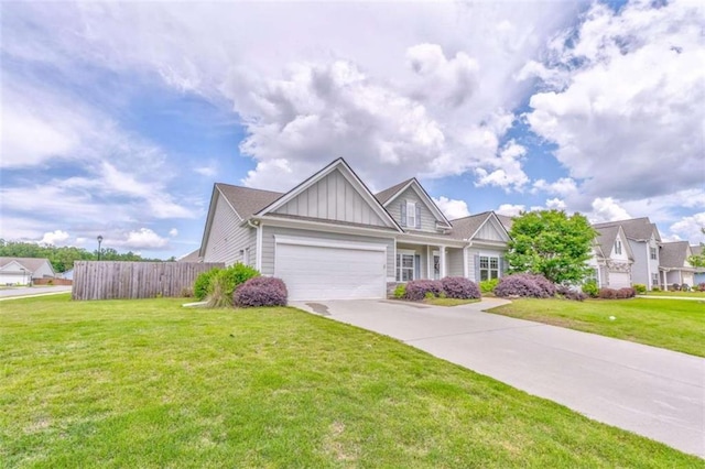 view of front facade featuring board and batten siding, an attached garage, and driveway