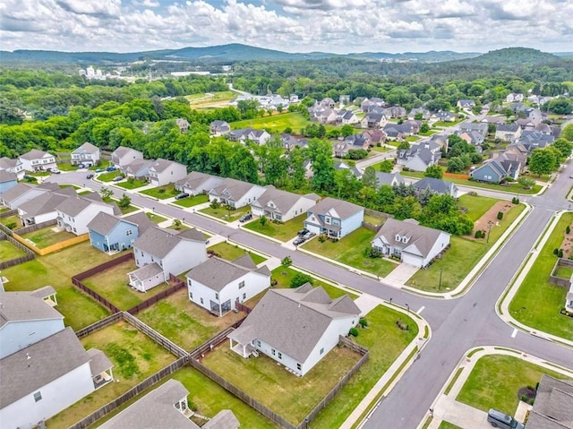 aerial perspective of suburban area with mountains