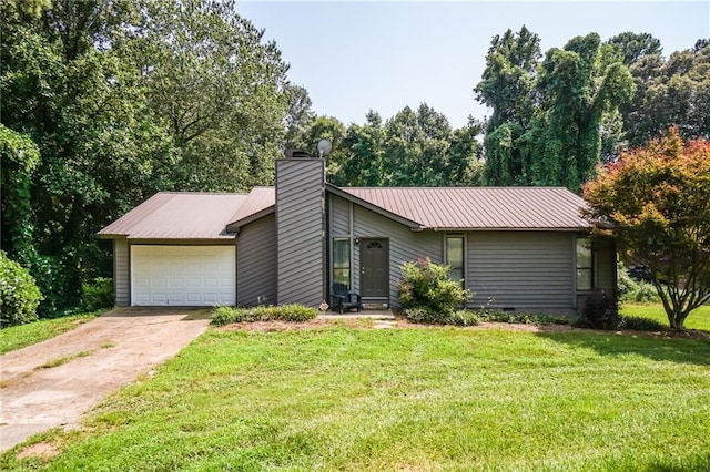 single story home with a garage and a front lawn