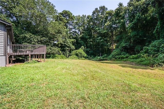 view of yard featuring a deck