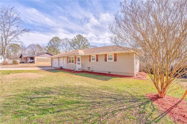 single story home featuring a garage and a front yard