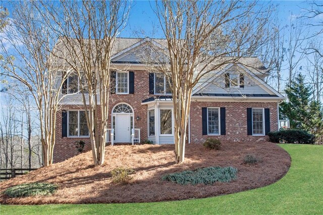 view of front of home with a front yard