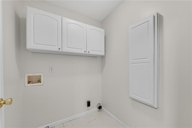 laundry area featuring hookup for a washing machine, cabinets, and hookup for an electric dryer