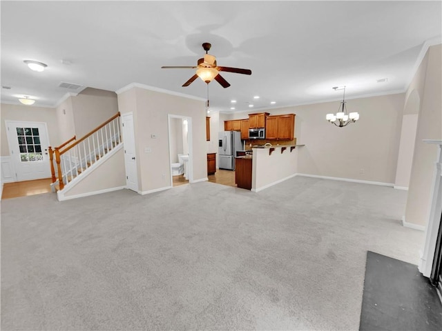 4206 Weavers White Ln Unit 17, Austell, GA 30106 - unfurnished living room with ceiling fan with notable chandelier, carpet floors, and ornamental molding