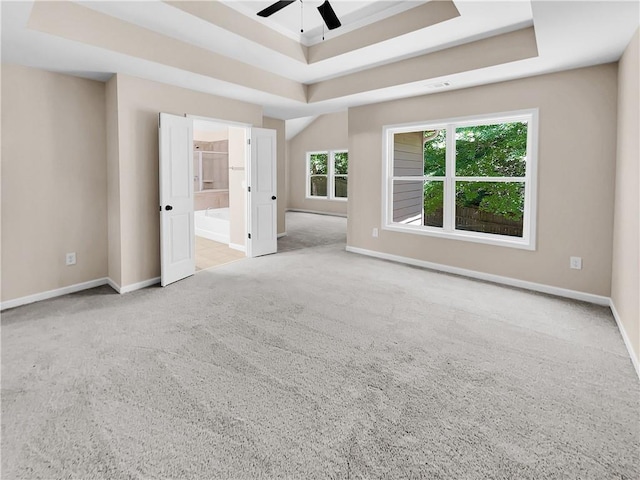 4206 Weavers White Ln Unit 17, Austell, GA 30106 - unfurnished bedroom featuring ensuite bathroom, light colored carpet, a raised ceiling, and ceiling fan