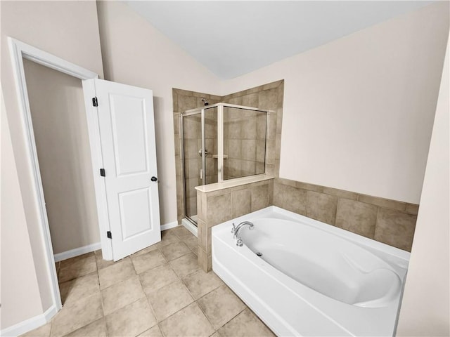 4206 Weavers White Ln Unit 17, Austell, GA 30106 - bathroom with lofted ceiling, independent shower and bath, and tile patterned floors