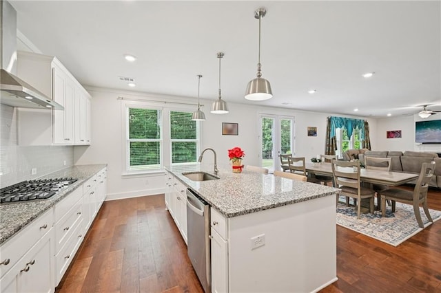 8125 Beryl Overlook, Gainesville, GA 30506 - kitchen with a sink, stainless steel appliances, wall chimney exhaust hood, recessed lighting, and dark wood-style floors