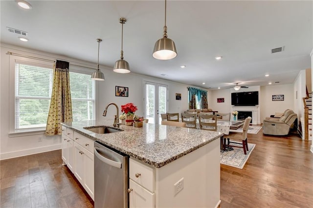 8125 Beryl Overlook, Gainesville, GA 30506 - kitchen featuring visible vents, stainless steel dishwasher, white cabinets, and a sink