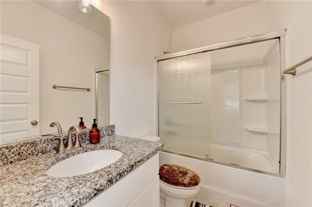 8125 Beryl Overlook, Gainesville, GA 30506 - bathroom with toilet, enclosed tub / shower combo, and vanity
