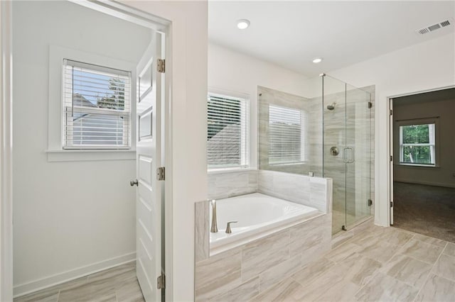 8125 Beryl Overlook, Gainesville, GA 30506 - bathroom with a bath, a shower stall, and healthy amount of natural light
