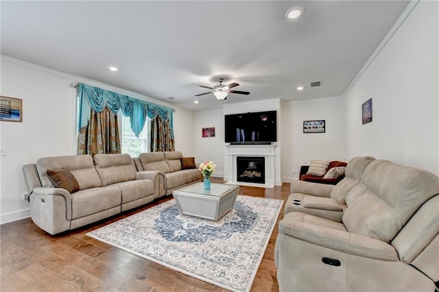 8125 Beryl Overlook, Gainesville, GA 30506 - living area with crown molding, recessed lighting, ceiling fan, and visible vents