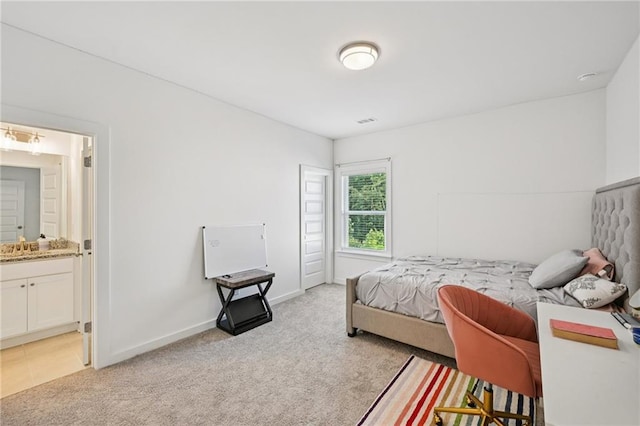 8125 Beryl Overlook, Gainesville, GA 30506 - bedroom featuring light carpet, connected bathroom, and baseboards