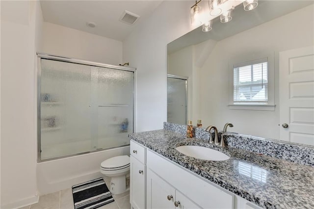 8125 Beryl Overlook, Gainesville, GA 30506 - bathroom with tile patterned flooring, toilet, vanity, visible vents, and bath / shower combo with glass door