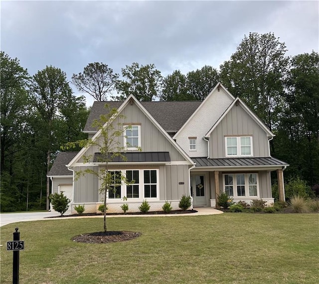 8125 Beryl Overlook, Gainesville, GA 30506 - view of front of property featuring a standing seam roof, a front yard, and board and batten siding