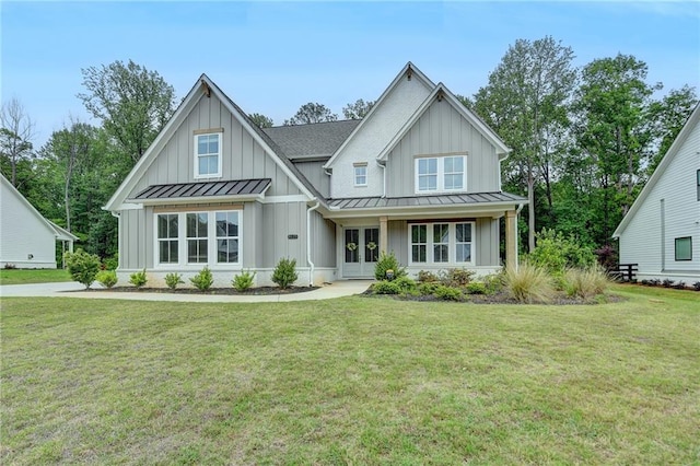 8125 Beryl Overlook, Gainesville, GA 30506 - modern farmhouse featuring a standing seam roof, board and batten siding, french doors, and a front yard