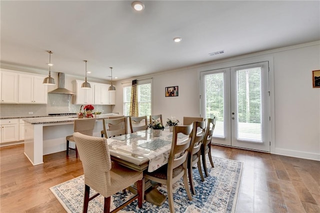 8125 Beryl Overlook, Gainesville, GA 30506 - dining room with crown molding, visible vents, light wood-style floors, recessed lighting, and french doors
